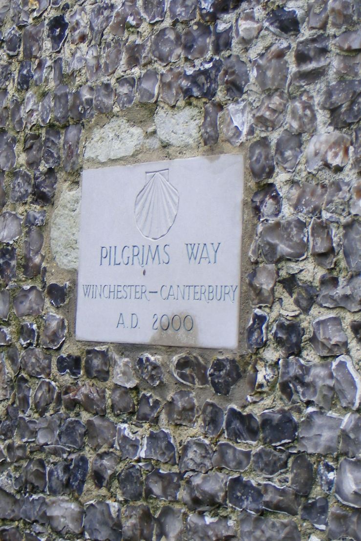 Waymark on the wall of St John the Baptist church, Alresford