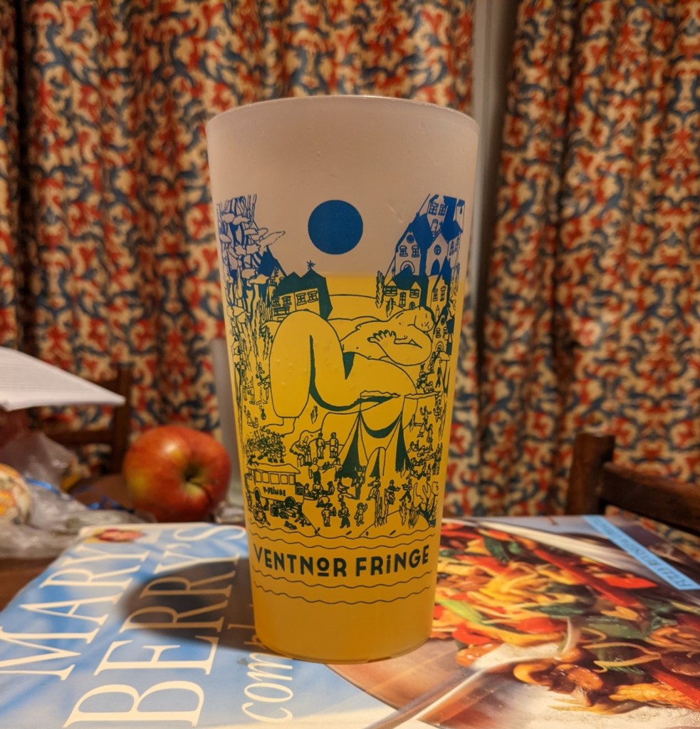 plastic tumbler with blue design representing the various things that go on at Ventnor Fringe Festival
