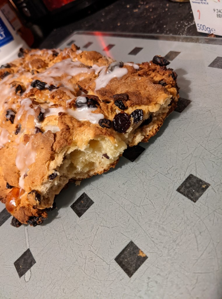 the crumbling end of a fruited bread