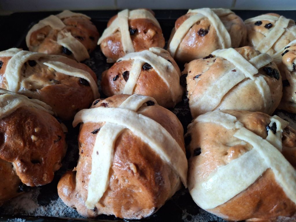 Tray of wonky but beautifully golden brown hot cross buns