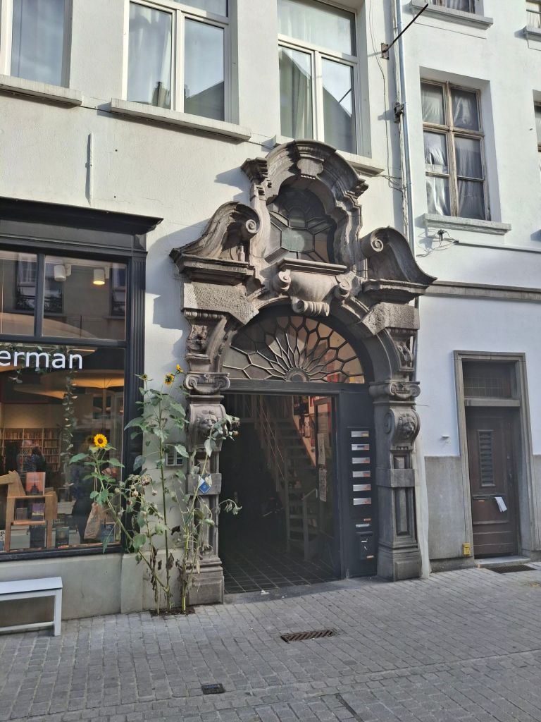 An elaborate doorway with a semi-circular fanlight